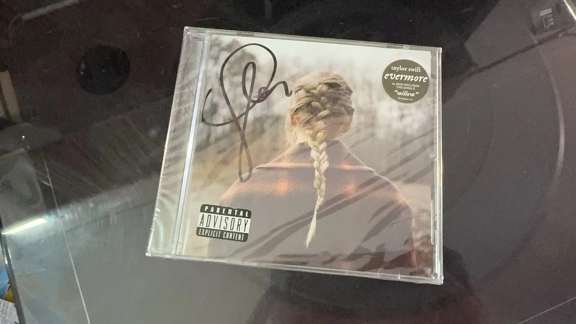 Taylor Swift Evermore autographed CD. Sealed