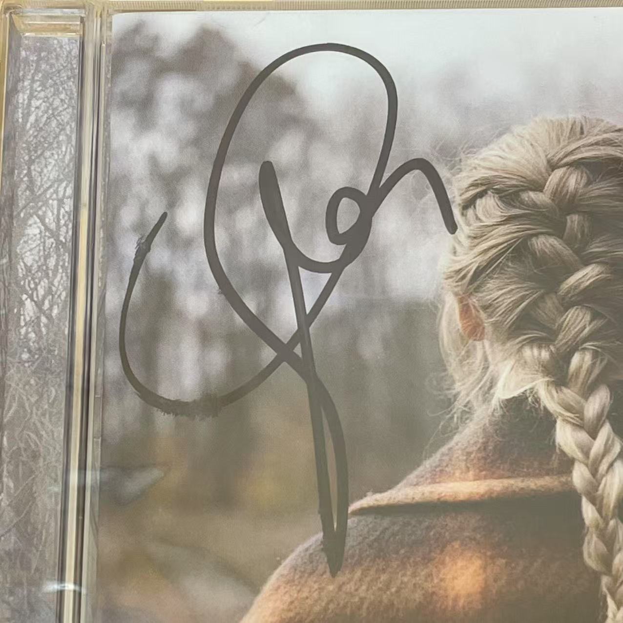 Taylor Swift - Rare Signed Evermore Album with Artistic Bold Signature