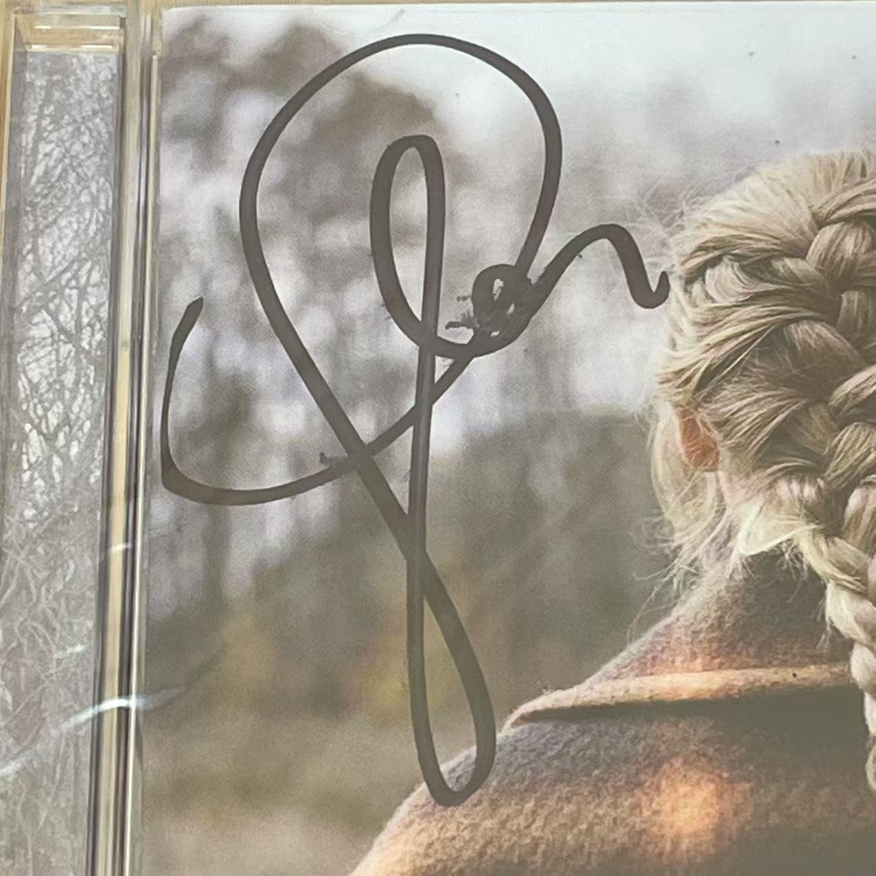 Taylor Swift - Exclusive Signed Evermore Album with Unique Signature