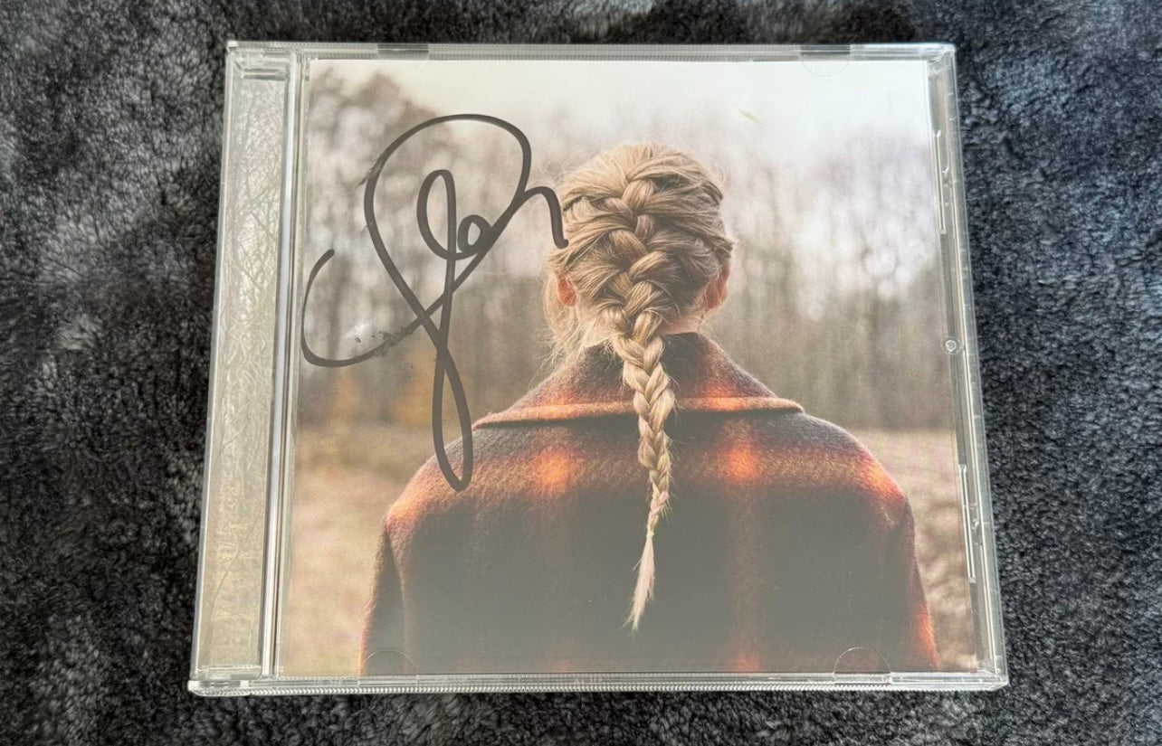 Taylor Swift Signed Evermore CD – Well-Preserved Condition