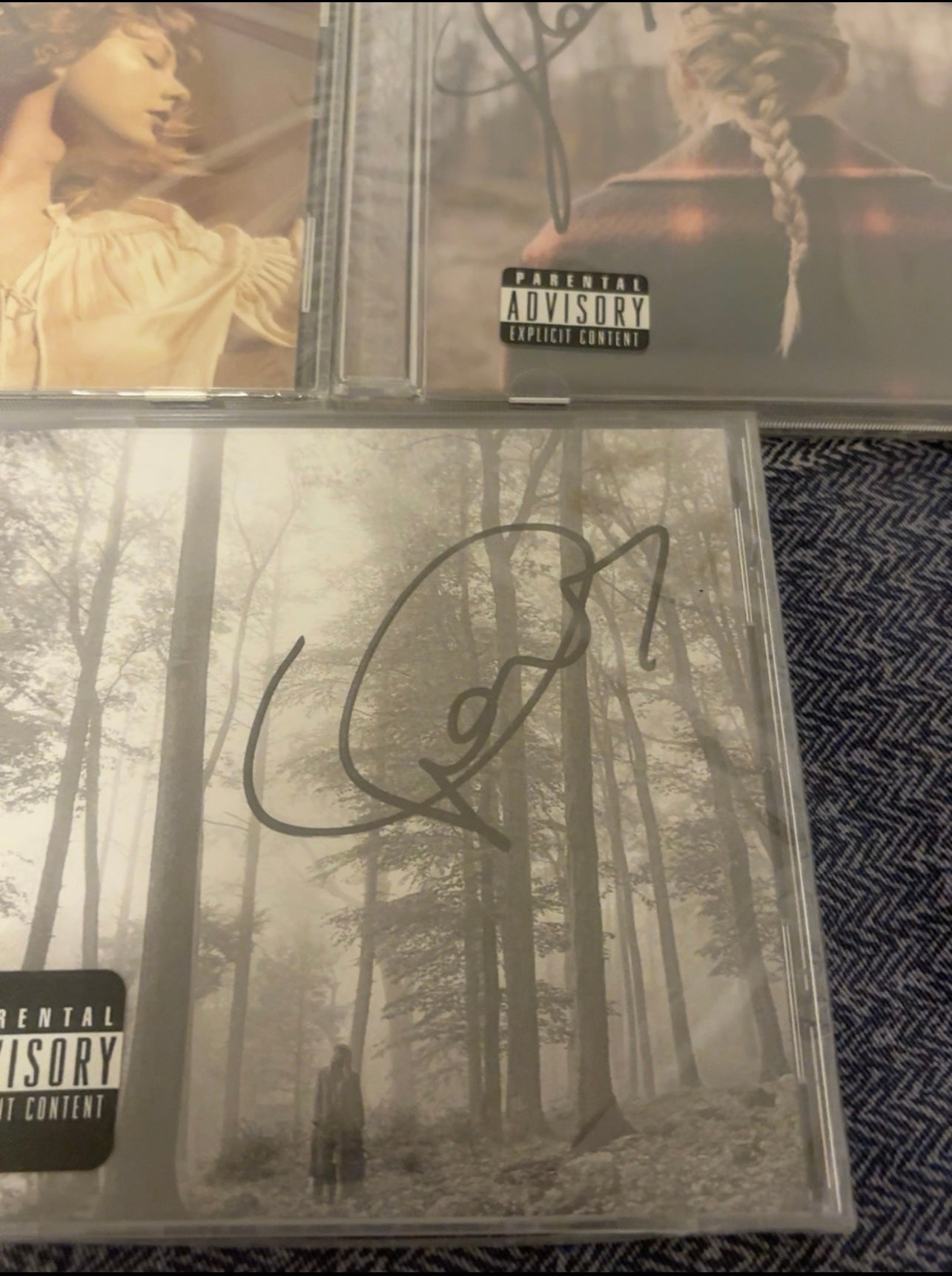 Taylor Swift – Folklore, Evermore, and Fearless (Taylor’s Version) Signed CD Bundle