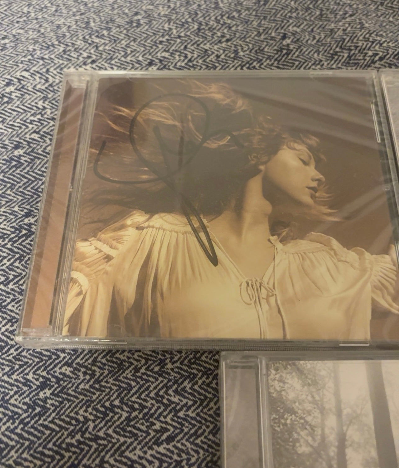 Taylor Swift – Folklore, Evermore, and Fearless (Taylor’s Version) Signed CD Bundle