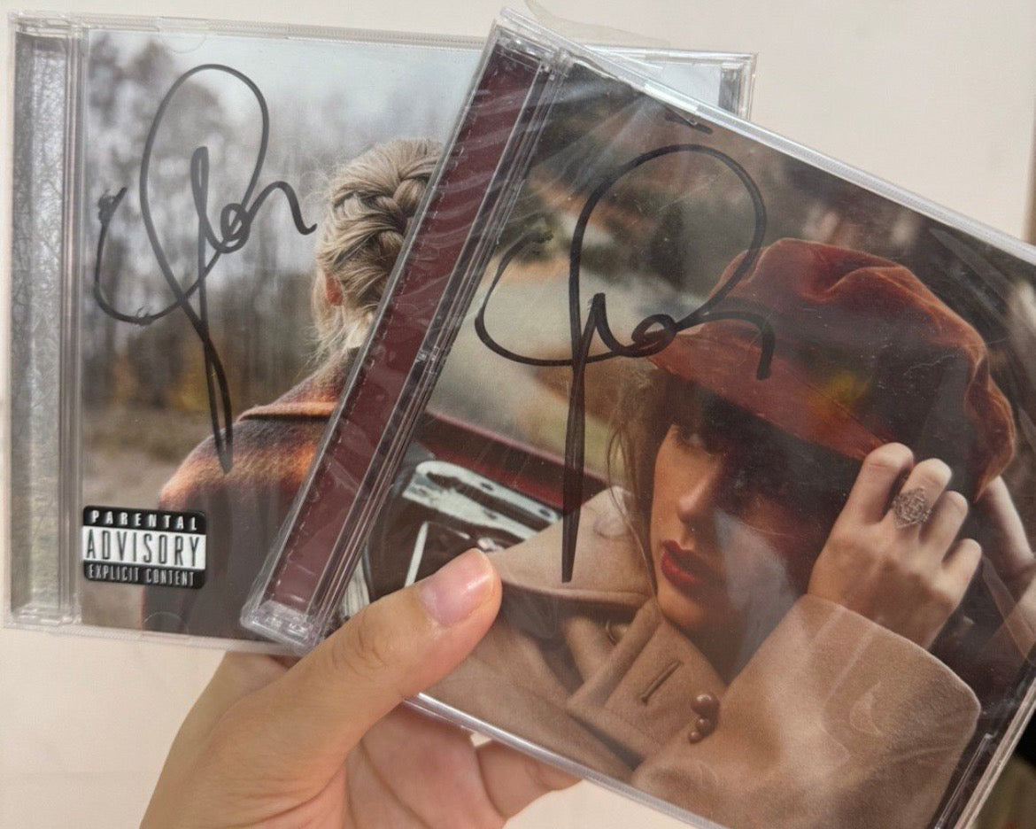 Taylor Swift Evermore and Red TV Signed CDs (2 CD Set)