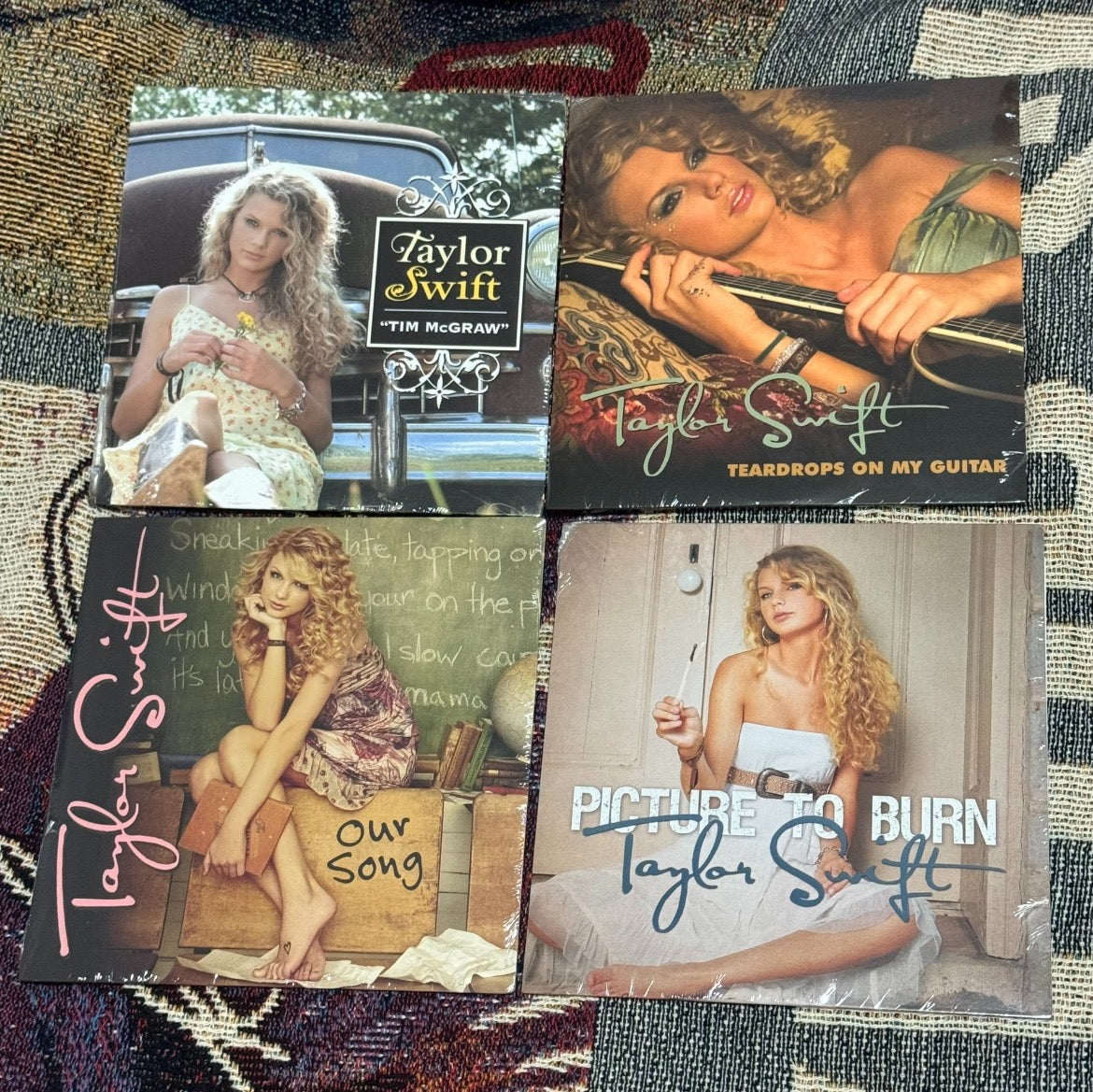 Taylor Swift’s Four Most Collectible 7-Inch Vinyl Records - Brand New, Unopened Bundle for Sale