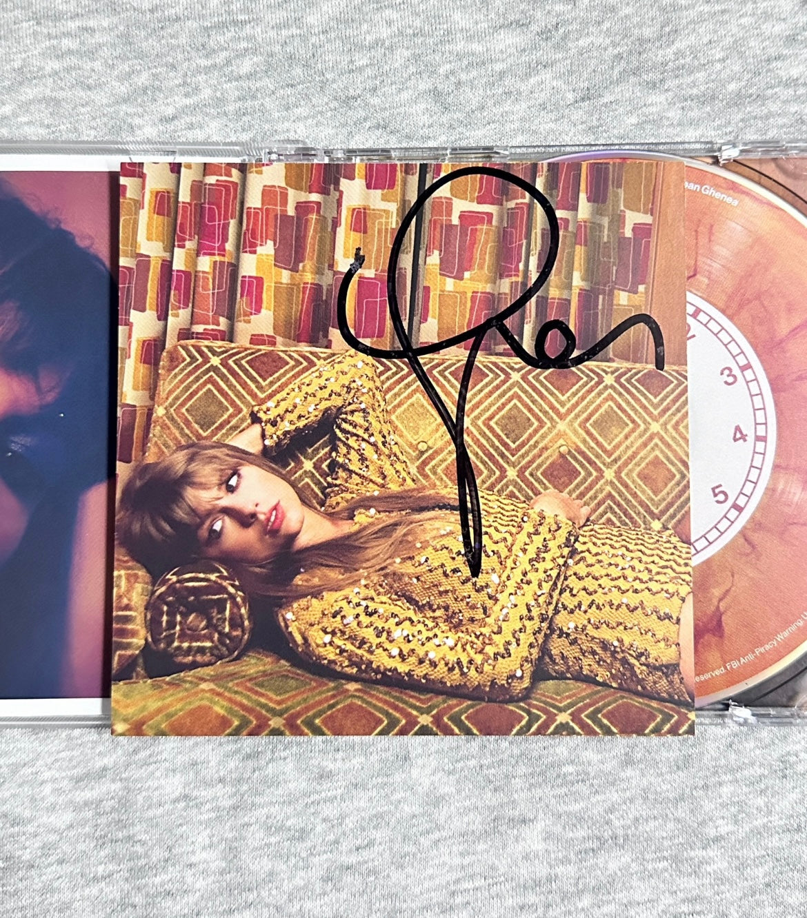 Taylor_Swift_Midnights_CD_with_Autograph_Blood_Moon_Edition